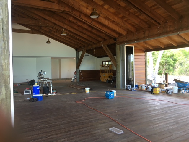 Exposed timber ceiling and hardwood flooring in a pavilion build