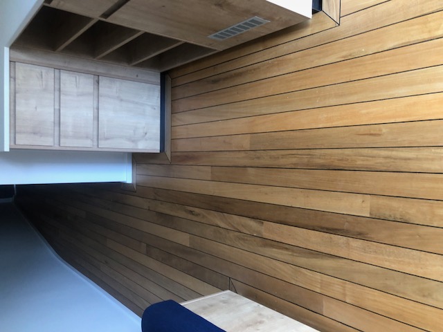 Installed hardwood timber flooring running through a finished room in Mackay