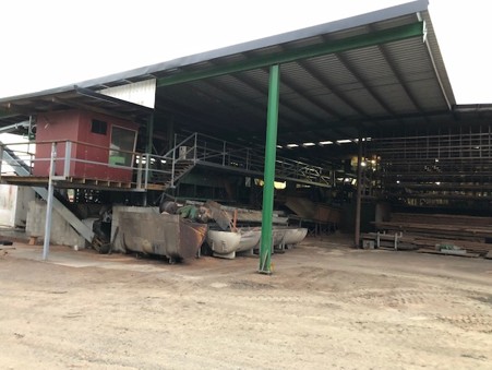 Twin edger and timber racks under the sheds at the Platypus Timbers sawmill
