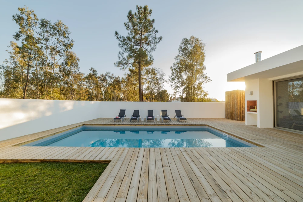 Timber decking around a pool built from Platypus Timbers hardwood